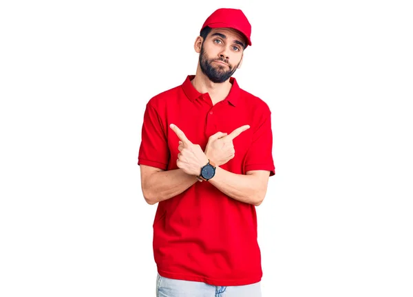 Mladý Pohledný Muž Plnovousem Uniformě Ukazující Obě Strany Prsty Jiný — Stock fotografie
