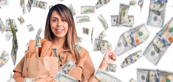 Young Beautiful Woman Holding Paper Bag Bread Smiling Happy Pointing — Stock Photo, Image