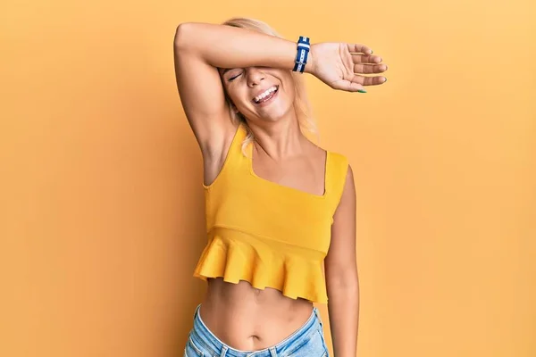 Young Blonde Girl Wearing Casual Clothes Covering Eyes Arm Smiling — Stock Photo, Image