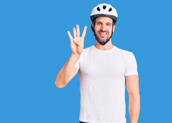 Young Handsome Man Wearing Bike Helmet Showing Pointing Fingers Number — Stock Photo, Image