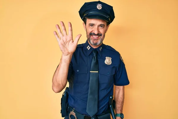 Hombre Hispano Mediana Edad Vistiendo Uniforme Policial Mostrando Señalando Con —  Fotos de Stock