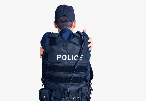 Young Handsome Man Wearing Police Uniform Hugging Oneself Happy Positive Royalty Free Stock Images