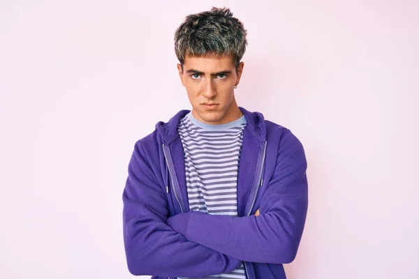 Young Handsome Man Wearing Casual Purple Sweatshirt Skeptic Nervous Disapproving — Stock Photo, Image