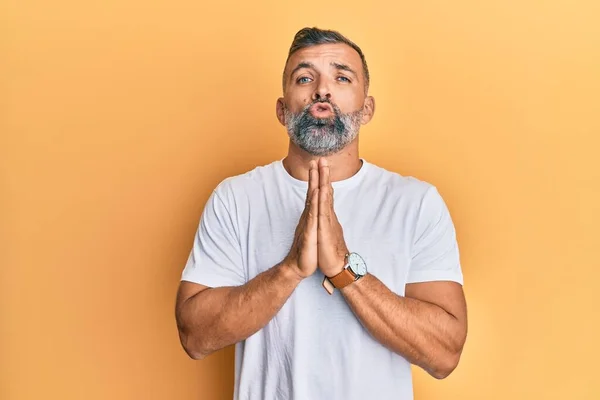 Middle Age Handsome Man Wearing Casual White Tshirt Begging Praying — Stock Photo, Image
