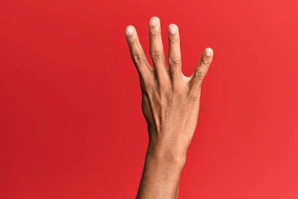 Χέρι Του Ισπανόφωνου Ανθρώπου Πάνω Από Κόκκινο Απομονωμένο Φόντο Καταμέτρηση — Φωτογραφία Αρχείου