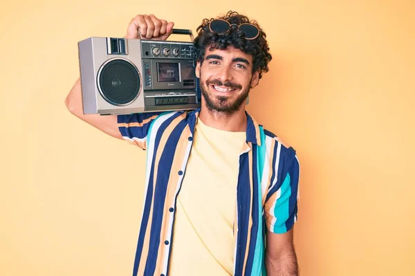 Handsome Young Man Curly Hair Bear Holding Boombox Listening Music — Stockfoto