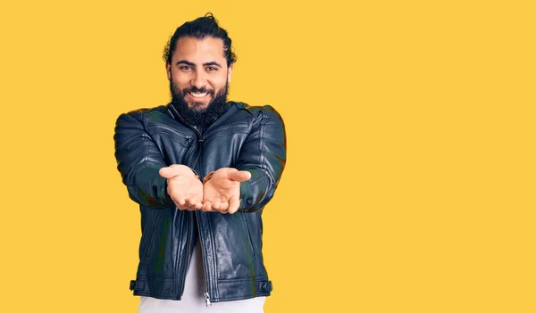 Young Arab Man Wearing Casual Leather Jacket Smiling Hands Palms — Stock Photo, Image