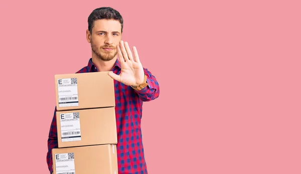 Handsome Young Man Bear Holding Delivery Packages Open Hand Doing — Stock Photo, Image