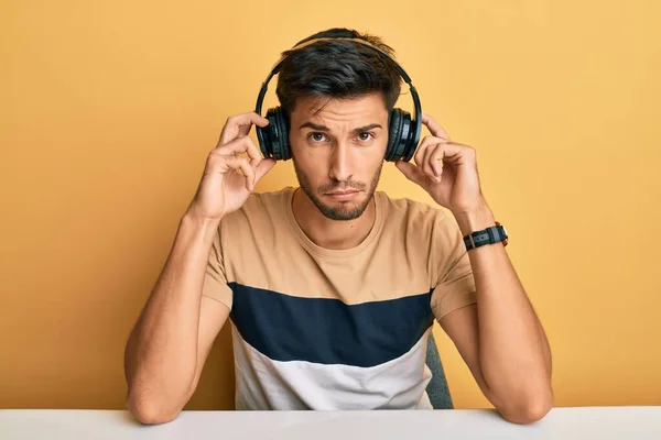 Young Handsome Man Listening Music Wearing Headphones Depressed Worry Distress — Stock Photo, Image