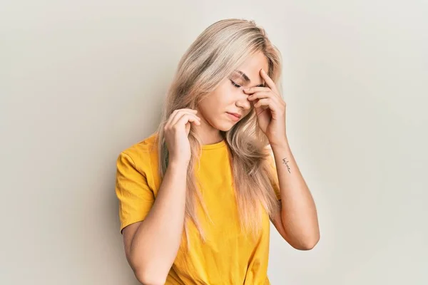 Beautiful Caucasian Blonde Girl Wearing Casual Tshirt Tired Rubbing Nose — Stock Photo, Image