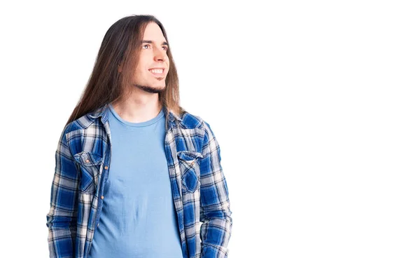 Young Adult Man Long Hair Wearing Casual Shirt Looking Away — Stock Photo, Image