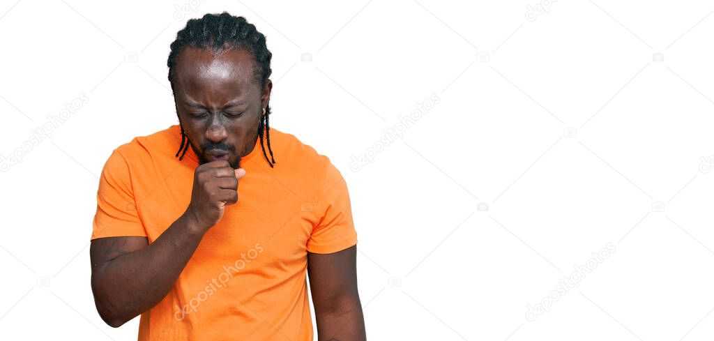 Handsome young african american man wearing casual clothes feeling unwell and coughing as symptom for cold or bronchitis. health care concept. 