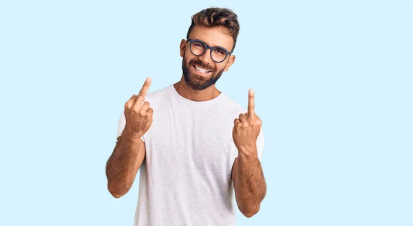Young Hispanic Man Wearing Casual Clothes Glasses Showing Middle Finger — 图库照片