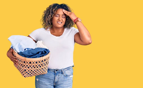Young African American Size Woman Holding Laundry Basket Stressed Frustrated — Φωτογραφία Αρχείου