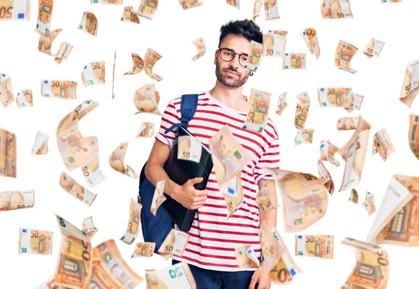 Young Hispanic Man Wearing Student Backpack Glasses Holding Binder Thinking — Stock Photo, Image