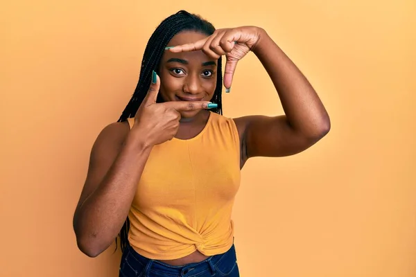 Young African American Woman Wearing Casual Clothes Smiling Making Frame — Stock Photo, Image