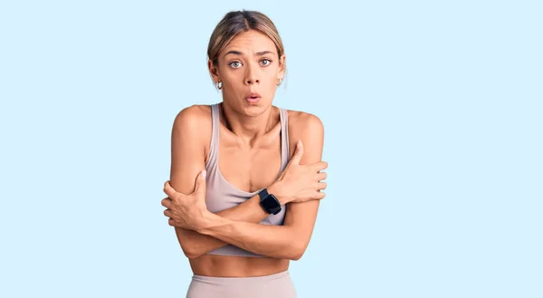 Beautiful Caucasian Woman Wearing Sportswear Shaking Freezing Winter Cold Sad — Stock Photo, Image