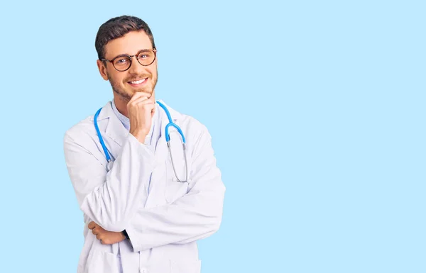Handsome Young Man Bear Wearing Doctor Uniform Looking Confident Camera — Stock Photo, Image