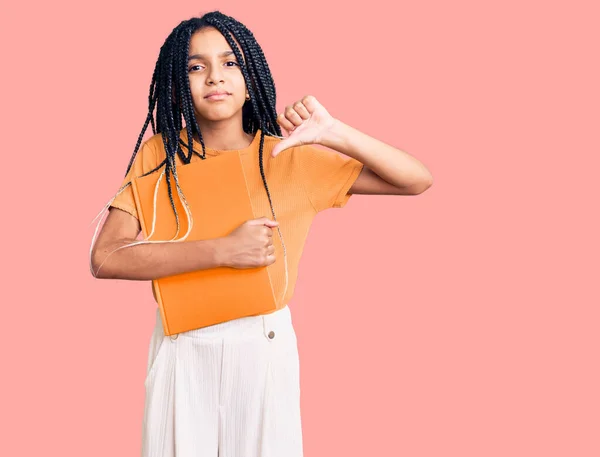 Cute African American Girl Holding Notebook Angry Face Negative Sign — Stock Photo, Image