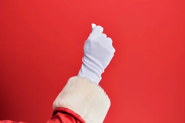 Mano Hombre Con Traje Santa Claus Guantes Sobre Fondo Rojo — Foto de Stock