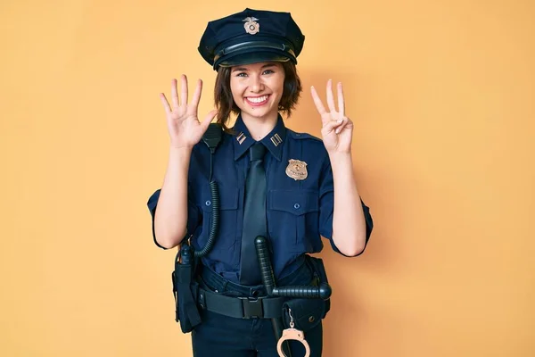 Joven Hermosa Mujer Con Uniforme Policía Mostrando Señalando Hacia Arriba —  Fotos de Stock