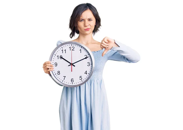 Young Beautiful Girl Holding Big Clock Angry Face Negative Sign — Stock Photo, Image