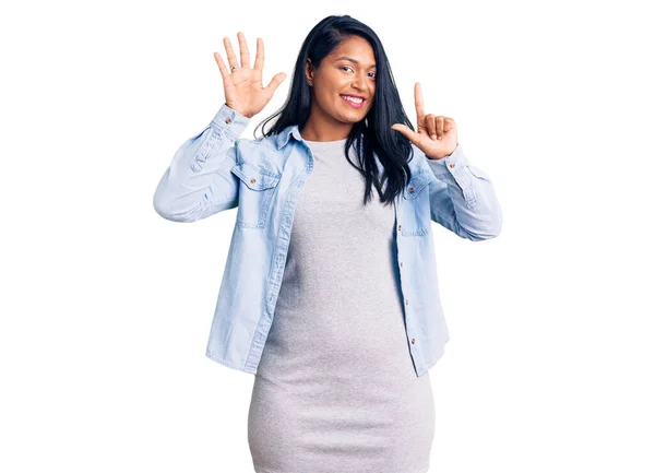 Hispanic Woman Long Hair Wearing Casual Denim Jacket Showing Pointing — Stock Photo, Image