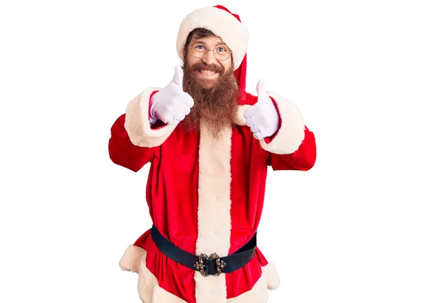 Uzun Sakallı Yakışıklı Noel Baba Kostümü Giyen Eli Ile Olumlu — Stok fotoğraf