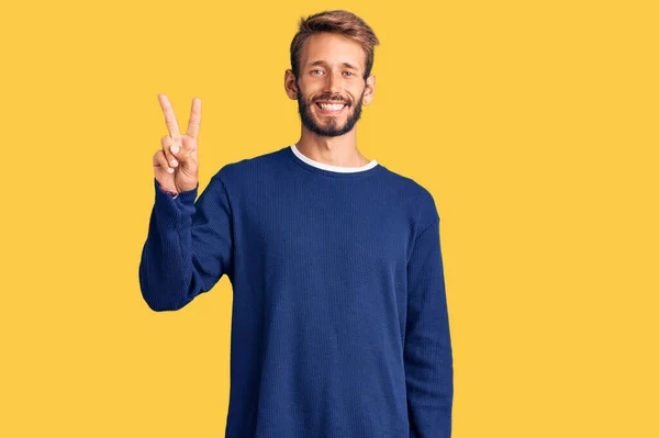 Handsome Blond Man Beard Wearing Casual Sweater Showing Pointing Fingers — Stock Photo, Image