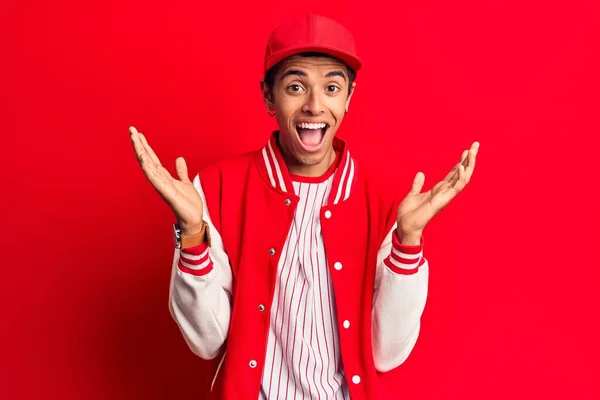 Young African Amercian Man Wearing Baseball Uniform Celebrating Victory Happy — Stock Photo, Image