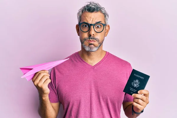 Middle Age Grey Haired Man Holding Paper Plane Passport Puffing — Stock Photo, Image