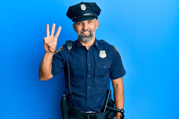 Homem Bonito Meia Idade Vestindo Uniforme Policial Mostrando Apontando Para — Fotografia de Stock