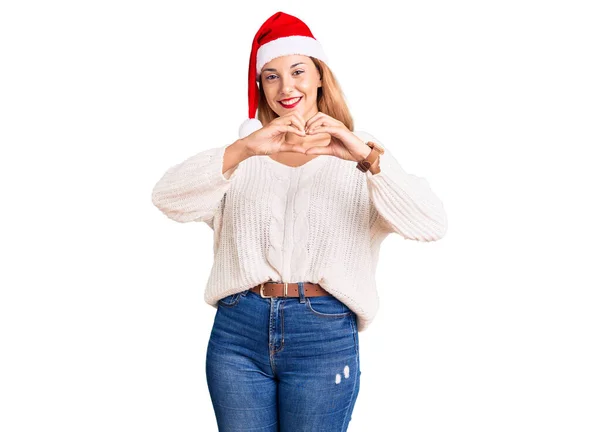 Piękna Młoda Kobieta Świątecznym Kapeluszu Uśmiecha Się Miłości Pokazując Symbol — Zdjęcie stockowe
