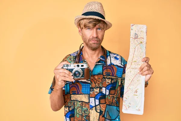 Young Blond Man Holding Vintage Camera City Map Relaxed Serious — Stock Photo, Image