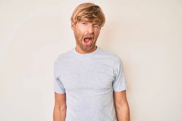 Young Blond Man Wearing Casual Clothes Winking Looking Camera Sexy — Stock Photo, Image