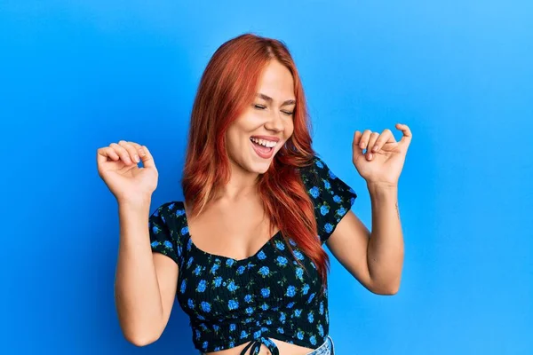 Young Beautiful Redhead Woman Wearing Casual Clothes Blue Background Dancing — Stock Photo, Image