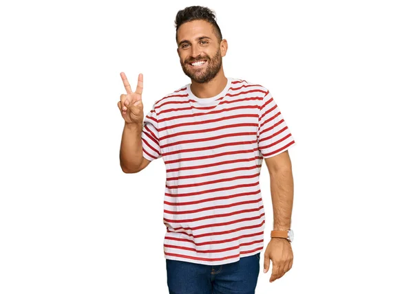 Handsome Man Beard Wearing Striped Tshirt Smiling Happy Face Winking — Stock Photo, Image