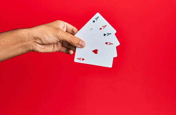 Hand Hispanic Man Holding Poker Cards Isolated Red Background — Stock Photo, Image
