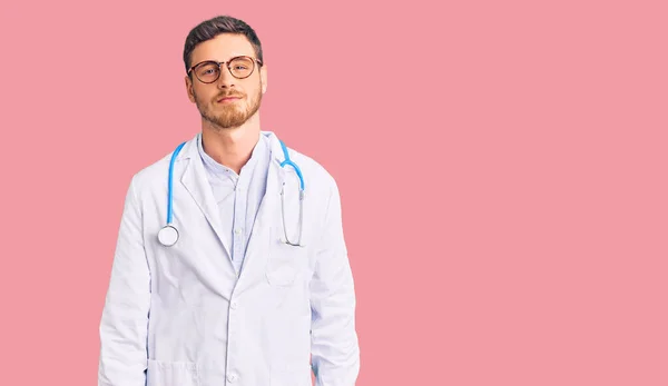 Handsome Young Man Bear Wearing Doctor Uniform Relaxed Serious Expression — Stock Photo, Image