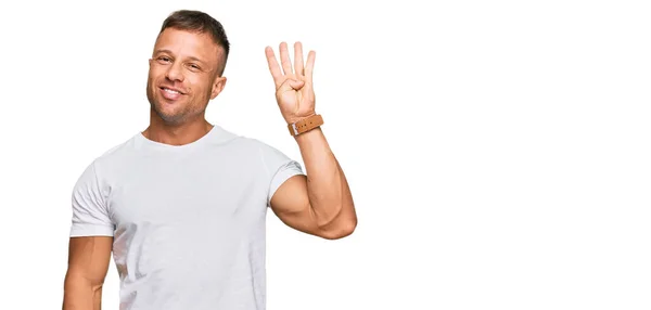 Hombre Musculoso Guapo Usando Camiseta Blanca Casual Mostrando Apuntando Hacia —  Fotos de Stock