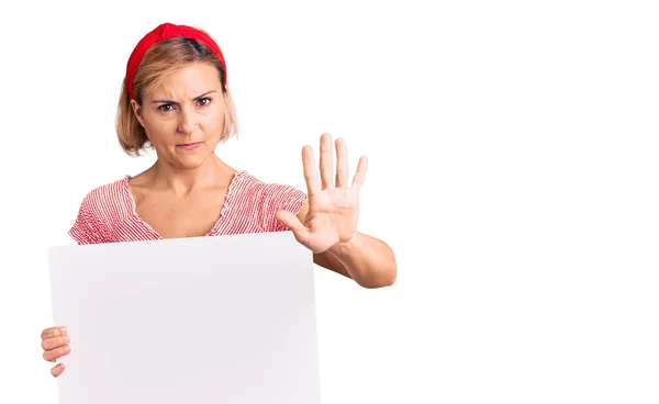 Young Blonde Woman Holding Blank Empty Banner Open Hand Doing — Stock Photo, Image