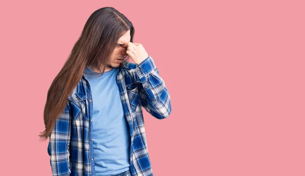 Young Adult Man Long Hair Wearing Casual Shirt Tired Rubbing — Stock Photo, Image