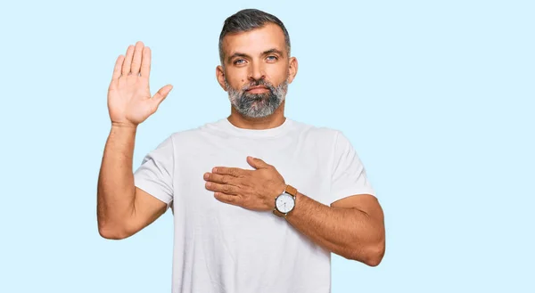 Middle Age Handsome Man Wearing Casual White Tshirt Swearing Hand — Stock Photo, Image