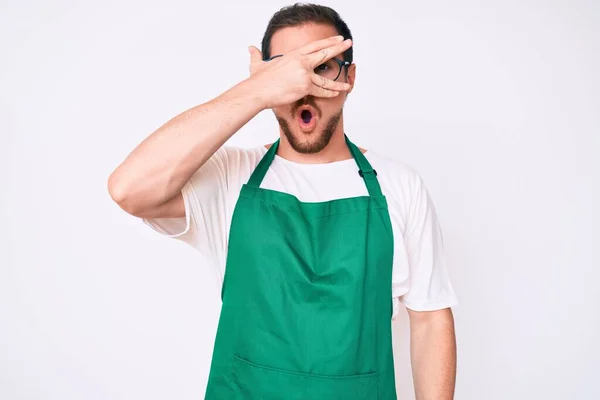 Young Handsome Man Wearing Apron Peeking Shock Covering Face Eyes — Stock Photo, Image