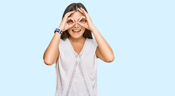 Young Caucasian Woman Wearing Casual Clothes Doing Gesture Binoculars Sticking — Stock Photo, Image