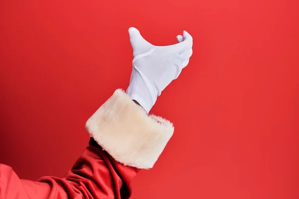 Hand Man Wearing Santa Claus Costume Gloves Red Background Holding — Stock Photo, Image