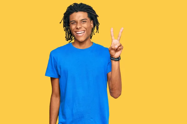 Young African American Man Wearing Casual Clothes Showing Pointing Fingers — Stock Photo, Image