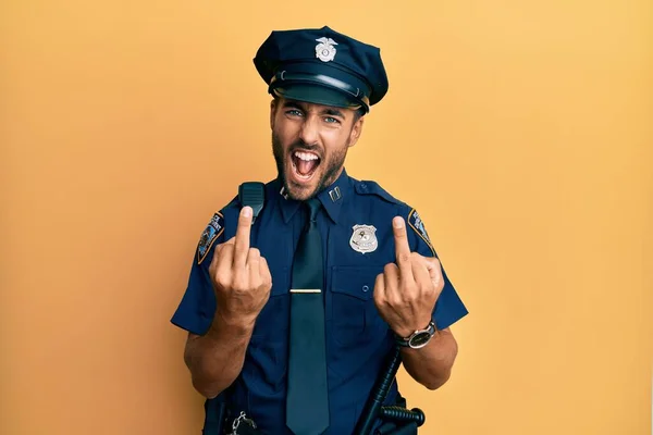 Handsome Hispanic Man Wearing Police Uniform Showing Middle Finger Doing — Fotografia de Stock