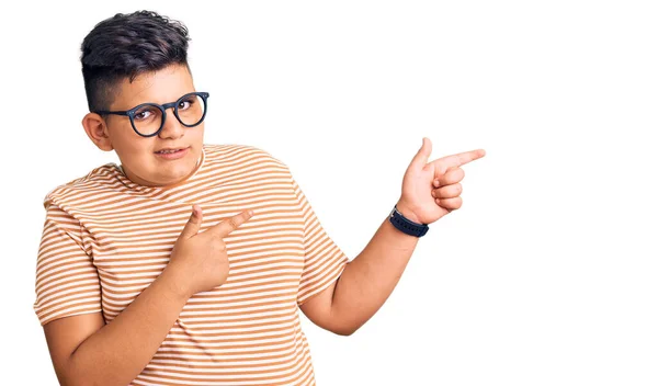 Little Boy Kid Wearing Casual Clothes Glasses Pointing Aside Worried — Stock Photo, Image
