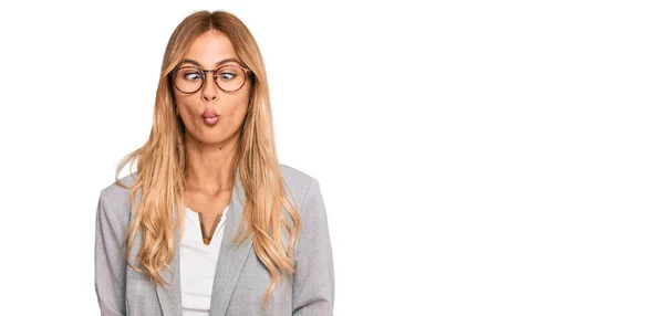 Beautiful Blonde Young Woman Wearing Business Clothes Making Fish Face — Stock Photo, Image